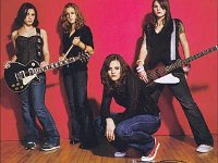 The Donnas  Lead singer Anderson wears red chucks, contrary to the band's mostly black attire.