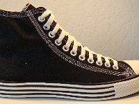 Double Details High Top Chucks  Outside view of a right black double details high top.