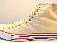 Double Details High Top Chucks  Outside view of a left natural white double details high top.