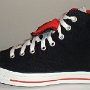Double Tongue High Top Chucks  Outside view of a left black and red double tongue high top.