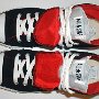 Double Tongue High Top Chucks  Top view of black and red double tongue high tops.