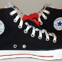 Double Tongue High Top Chucks  Inside patch views of black and red double tongue high tops.