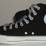 Double Tongue High Top Chucks  Inside patch view of a right black and gray double tongue high top with gray shoelaces.