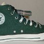 Double Tongue High Top Chucks  Inside patch view of a left trekking green and plaid double tongue high top.