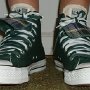 Double Tongue High Top Chucks  Wearing trekking green and plaid double tongue high tops, front view 1.