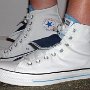 Double Tongue High Top Chucks  Wearing white and blue double tongue high tops, side view.