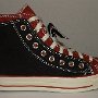 Double Upper High Top Chucks  Outside view of a right black and brick red double upper high top.