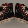 Double Upper High Top Chucks  Angled front view of black and brick red double upper high tops.