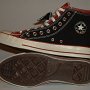 Double Upper High Top Chucks  Inside patch and sole views of black and brick red double upper high tops.