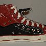 Double Upper High Top Chucks  Inside patch view of a folded down left black and brick red double upper high top.