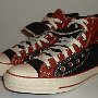Double Upper High Top Chucks  Angled side view of folded down black and brick red double upper high tops.
