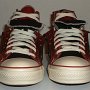 Double Upper High Top Chucks  Front view of folded down black and brick red double upper high tops.