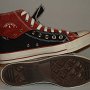 Double Upper High Top Chucks  Inside patch and sole views of folded down black and brick red double upper high tops.