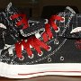Double Upper High Top Chucks  Inside patch views of black, red, and milk double upper high tops, with the outer uppers rolled down.