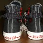 Double Upper High Top Chucks  Rear view of black, red, and milk double upper high tops, with the outer upper rolled down.