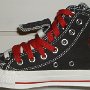 Double Upper High Top Chucks  Inside patch view of a right black, red, and milk double upper high top.