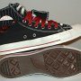 Double Upper High Top Chucks  Inside patch and sole views of black, red, and milk double upper high tops, with the outer uppers rolled down.