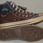 Double Upper High Top Chucks  Inside patch and sole views of folded down brown and navy blue double upper high tops.