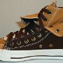 Double Upper High Top Chucks  Inside patch view of a right chocolate and sienna double upper high top, with the outer upper rolled down.