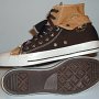 Double Upper High Top Chucks  Inside patch and sole views of chocolate and sienna double upper high tops, with the outer uppers rolled down.