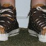 Double Upper High Top Chucks  Wearing chocolate and sienna double upper high tops, front view.