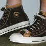 Double Upper High Top Chucks  Wearing chocolate and sienna double upper high tops, side view.