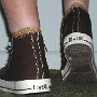 Double Upper High Top Chucks  Wearing chocolate and sienna double upper high tops, rear view.