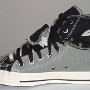 Double Upper High Top Chucks  Inside patch view of a right gray and black double upper high top, with the outer upper rolled down.