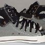 Double Upper High Top Chucks  Inside patch views of gray and black double upper high tops, with the outer uppers rolled down.