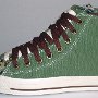Double Upper High Top Chucks  Outside view of a left olive, brown, and camouflage double upper high top.
