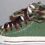 Double Upper High Top Chucks  Outside view of a left olive, brown, and camouflage double upper high top, with the outer upper rolled down