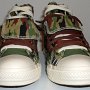 Double Upper High Top Chucks  Front view of olive, brown, and camouflage double upper high tops, with the outer upper rolled down.