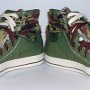 Double Upper High Top Chucks  Angled front views of olive, brown, and camouflage double upper high tops, with the outer uppers rolled down.