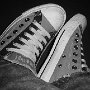 Double Upper High Top Chucks  Wearing grey and black double upper low cut chucks.