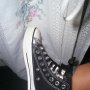 Double Upper High Top Chucks  Wearing black and print double upper high top chucks, shot 2.
