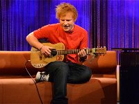 Ed Sheeran  Ed Sheeran singing a song.