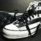 Flag Pattern Chucks  Black and white stars and bars high tops, left outside and sole views.