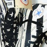 Flag Pattern Chucks  Black and white stars and bars high tops, right top and left inside patch views