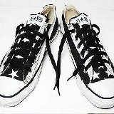 Flag Pattern Chucks  Black and white stars and bars low cut, angled top view.
