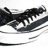 Flag Pattern Chucks  Black and white stars and bars low cut, angled side view.