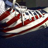Flag Pattern Chucks  Wearing stars and bars high tops, right outside view.