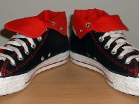 Foldover High Top Chucks  Black and red foldovers, angled front view.