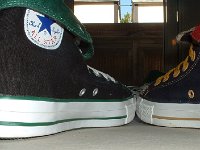 Foldover High Top Chucks  Closeup of a black/green and navy/red/gold foldover, rear and inside patch view.