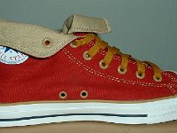 Foldover High Top Chucks  Left red and gold foldover, inside patch view.