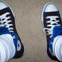 Foldover High Top Chucks  Wearing black and royal blue foldover high tops, top view.