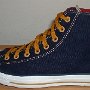 Foldover High Top Chucks  Left navy, red, and gold foldover high top with old gold laces, outside view.