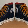 Foldover High Top Chucks  Navy, red, and gold foldover high tops with gold laces, angled front view.