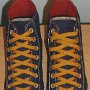 Foldover High Top Chucks  Navy, red, and gold foldover high tops with old gold laces, top view.