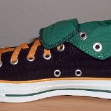 Foldover High Top Chucks  Inside patch view of a right black, green, amber foldover rolled down to the sixth eyelet.