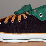 Foldover High Top Chucks  Outside view of a left black, green, amber foldover rolled down to the sixth eyelet.